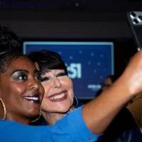 Philly poses with grad for selfie before Toast begins